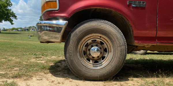 Front-end of a maroon pick-up truck